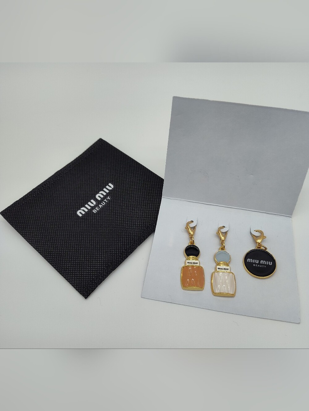MIU MIU Beauty Set of 3 Charms Perfume Bottle Logo Charm Gifting Collection NWT